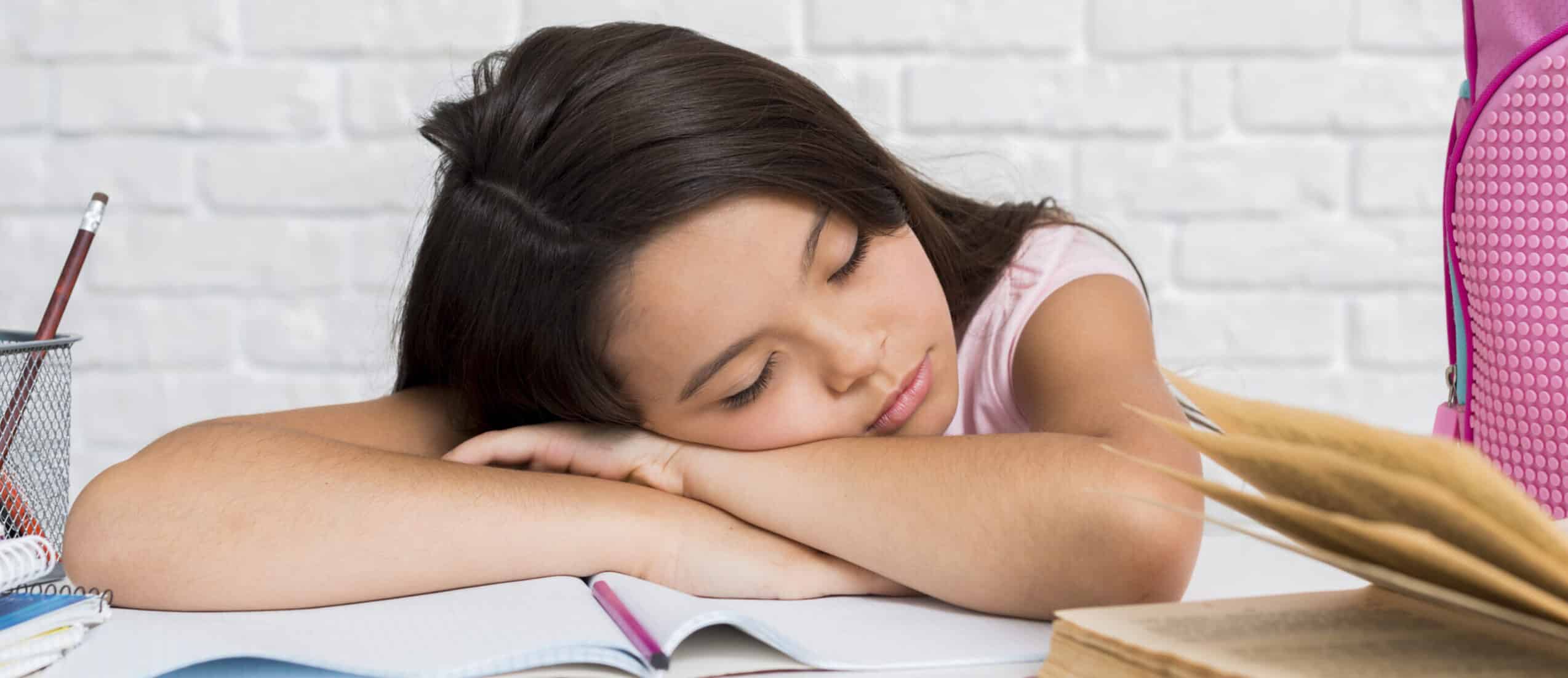 child sleeping in class